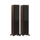 Salon 1 Audio Monitor Audio Bronze 300 7G floorstanding speakers in walnut finish with black grilles on outrigger feet.