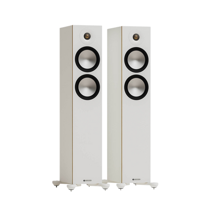 Salon 1 Audio Monitor Audio Bronze 300 7G white floorstanding speakers with C-CAM drivers and gold dome tweeters.