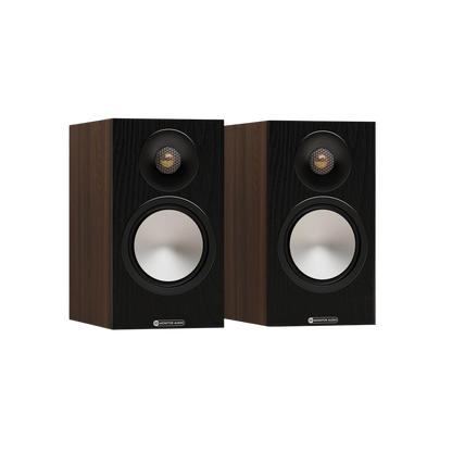 Salon 1 Audio Monitor Audio Bronze 50 7G bookshelf speakers in a black wood finish with gold dome tweeters.