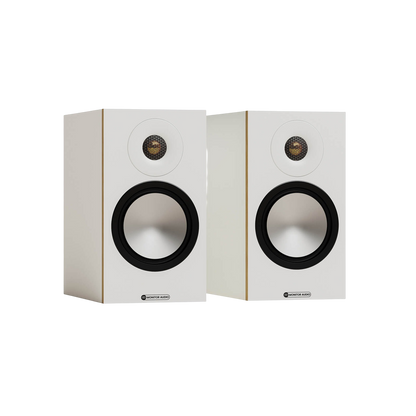 Salon 1 Audio pair of white Monitor Audio Bronze 50 7G bookshelf speakers with gold dome tweeters and C-CAM drivers.