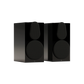 Salon 1 Audio Monitor Audio Gold 100 6G bookshelf speakers in high-gloss black with magnetic grilles attached.