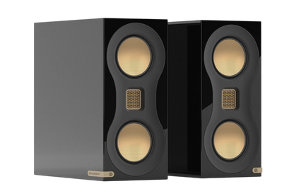 Salon 1 Audio Monitor Audio Studio 89 high-gloss black bookshelf speakers with gold-colored MTM driver configuration.