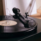 Salon 1 Audio Ortofon 2M Black moving magnet cartridge playing a vinyl record on a turntable tonearm