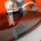 Salon 1 Audio Ortofon 2M Bronze moving magnet cartridge tracking a vinyl record with a Nude Fine Line diamond stylus.
