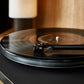 Salon 1 Audio Ortofon 2MR Black LVB 250 moving magnet cartridge installed on a turntable tonearm playing a vinyl record