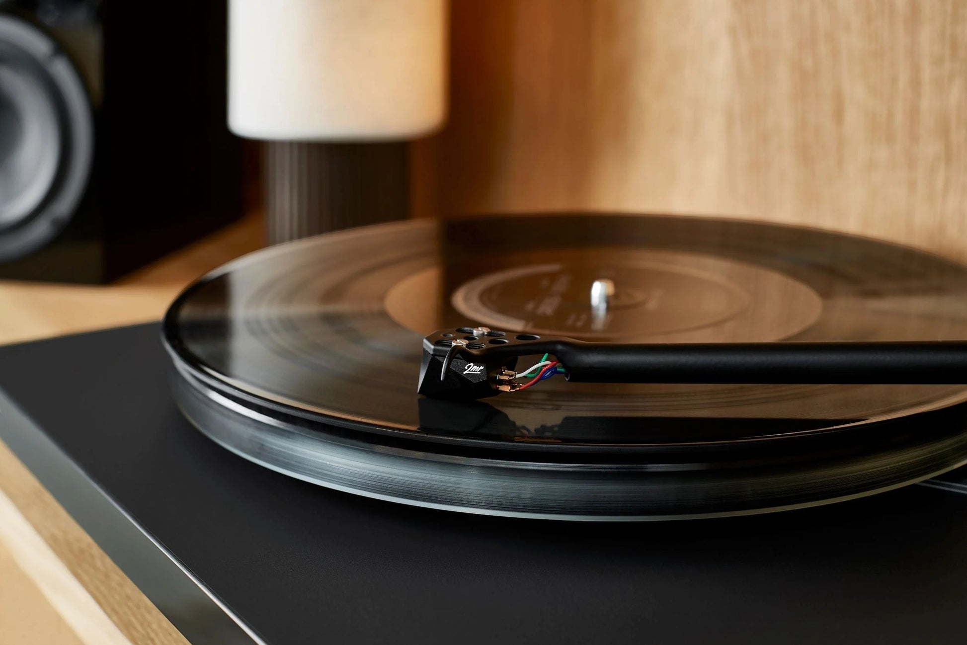 Salon 1 Audio Ortofon 2MR Black LVB 250 moving magnet cartridge installed on a turntable tonearm playing a vinyl record