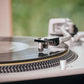 Salon 1 Audio Ortofon MC A Mono moving coil phono cartridge mounted on a turntable playing a vinyl record.