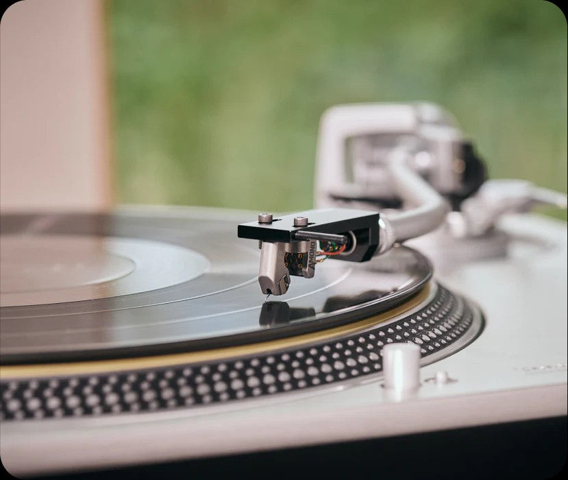 Salon 1 Audio Ortofon MC A Mono moving coil phono cartridge mounted on a turntable playing a vinyl record.