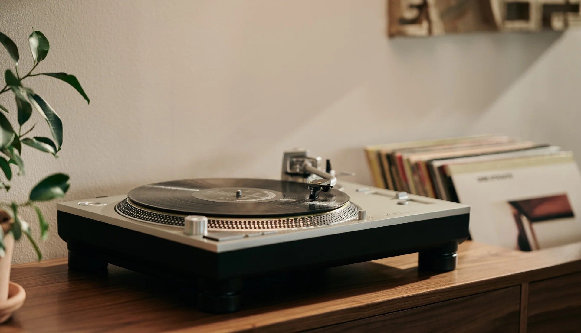 Salon 1 Audio Ortofon MC Cadenza Black phono cartridge playing a vinyl record on a turntable in a home setting