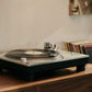 Salon 1 Audio Ortofon MC Cadenza Mono cartridge installed on a turntable playing a vinyl record in a home setting