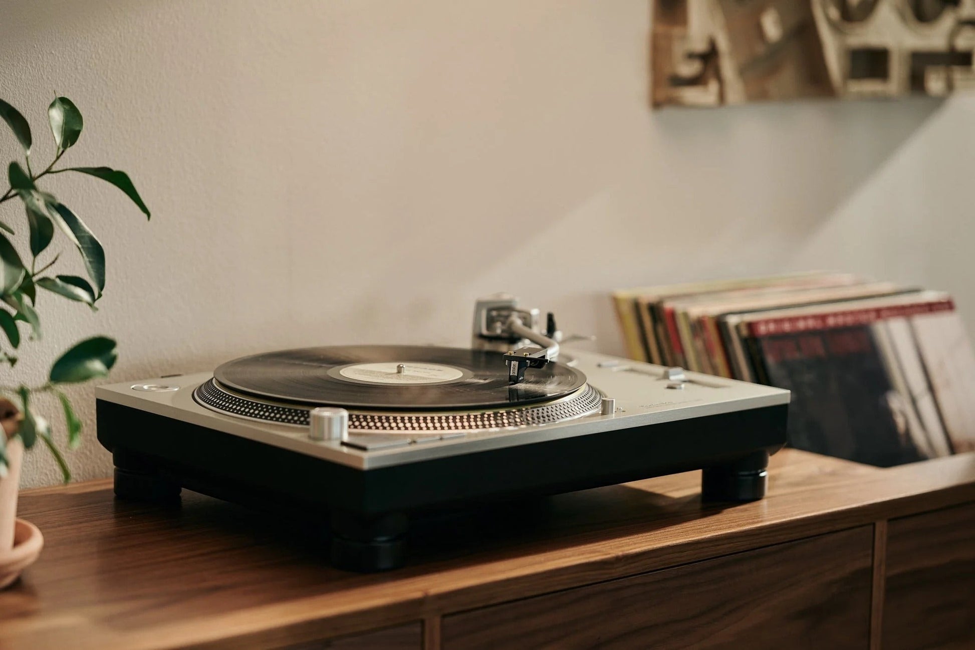 Salon 1 Audio Ortofon MC Cadenza Mono cartridge installed on a turntable playing a vinyl record in a home setting
