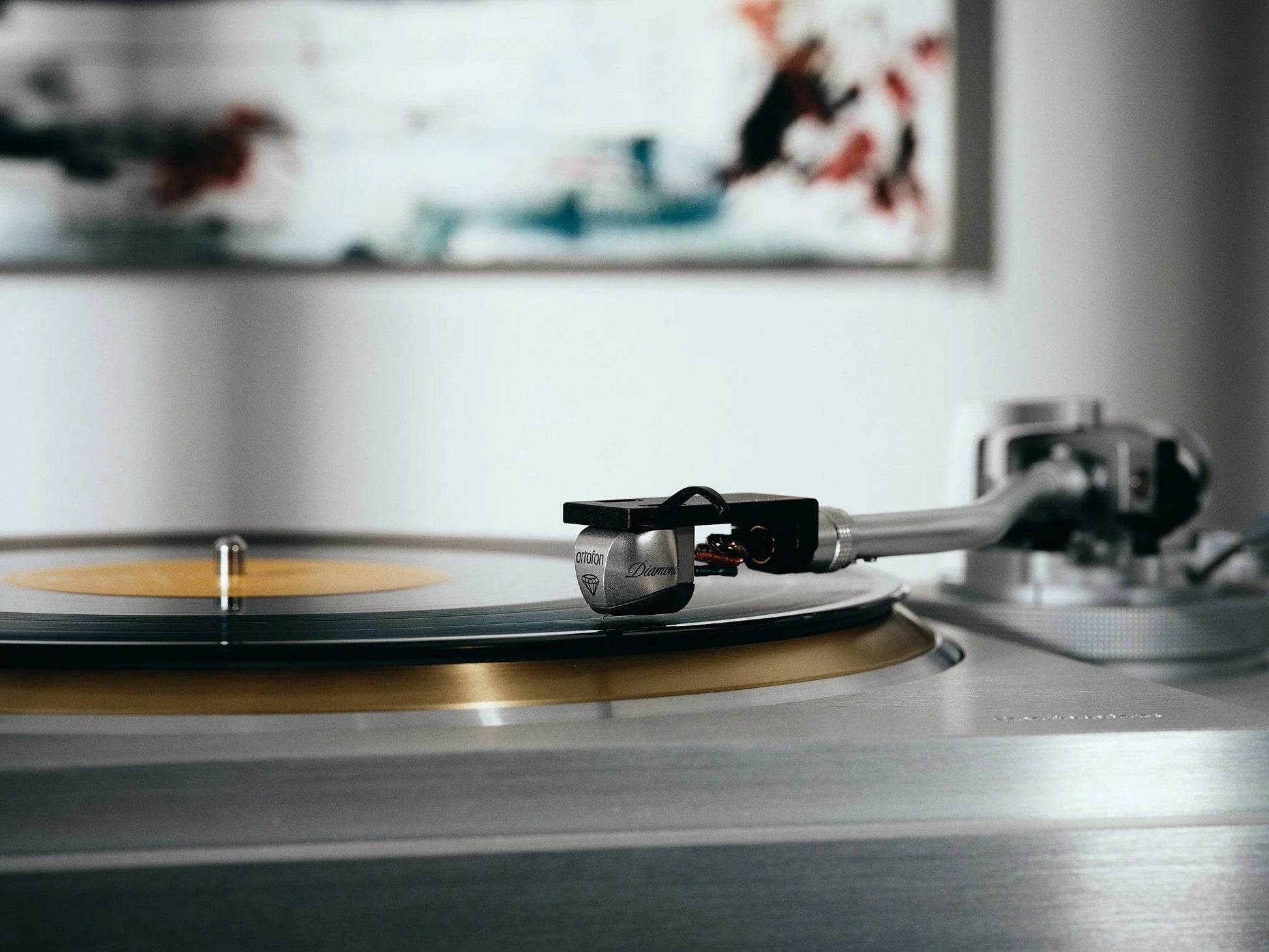 Salon 1 Audio Ortofon MC Diamond moving coil phono cartridge playing a vinyl record on a high-end turntable
