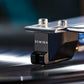 Salon 1 Audio Sumiko Amethyst moving magnet phono cartridge with nude line-contact stylus playing a vinyl record