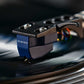 Salon 1 Audio Sumiko Blue Point No. 3 High output moving coil cartridge tracking on a black vinyl record.