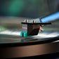 Salon 1 Audio Sumiko Olympia moving magnet phono cartridge with teal stylus tracking on a vinyl record