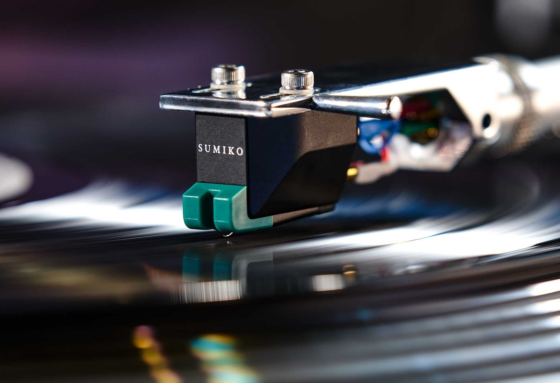 Salon 1 Audio Sumiko Olympia moving magnet phono cartridge with green stylus tracking on a vinyl record