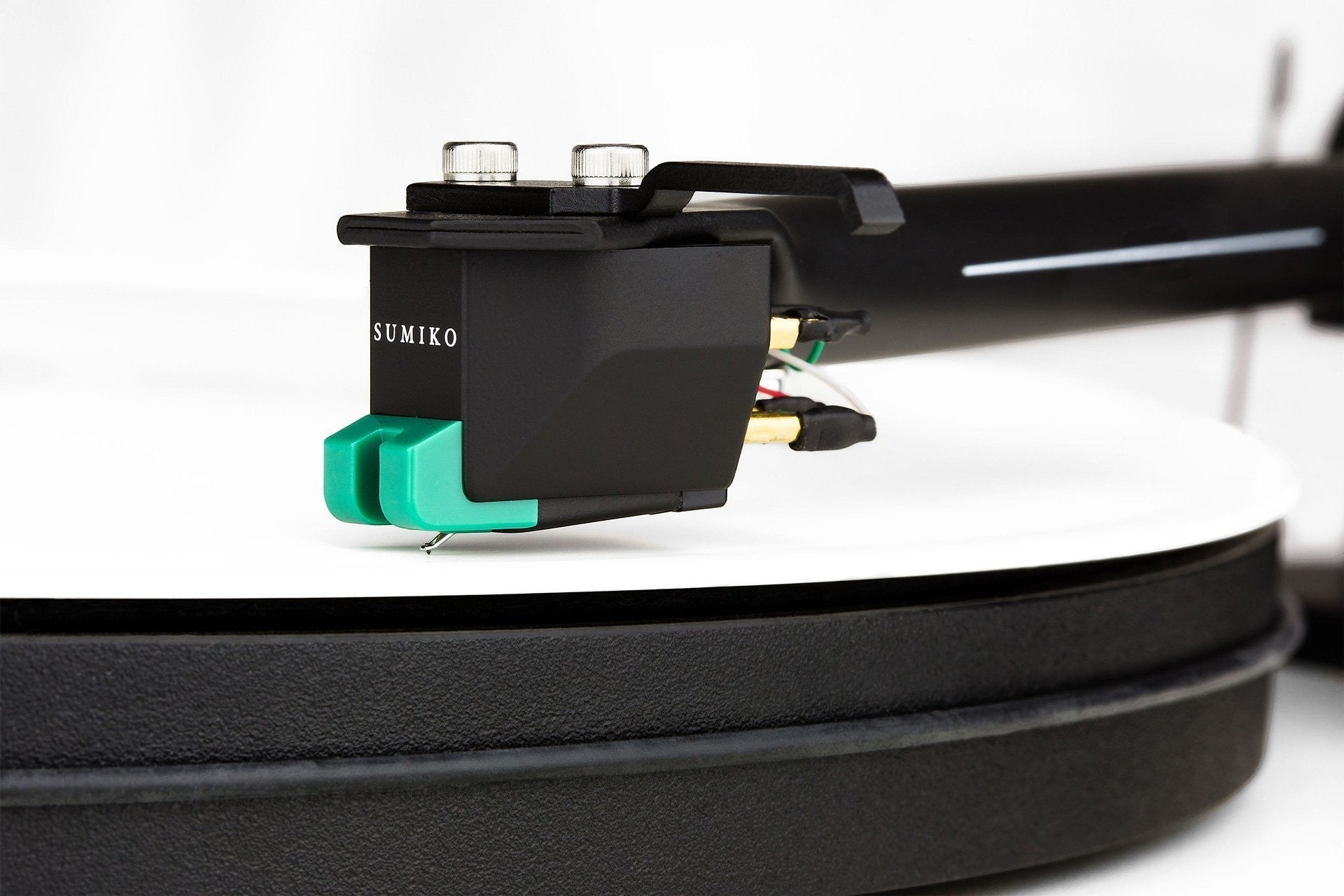 Salon 1 Audio Sumiko Olympia moving magnet phono cartridge with black body and teal stylus guard on a turntable