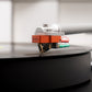 Salon 1 Audio Sumiko Oriole low output moving coil cartridge with nude Shibata stylus mounted on a turntable tonearm.