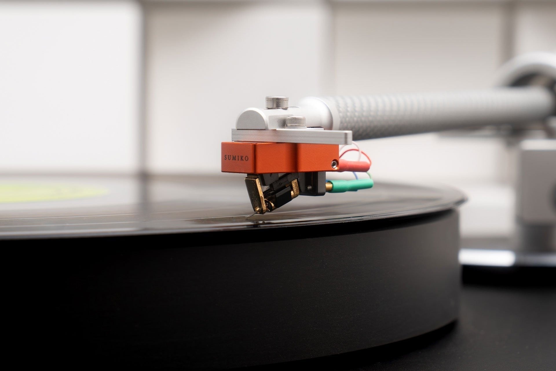 Salon 1 Audio Sumiko Oriole low output moving coil cartridge with nude Shibata stylus mounted on a turntable tonearm.