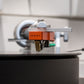 Salon 1 Audio Sumiko Oriole low output moving coil cartridge with orange body and Shibata stylus on a vinyl record