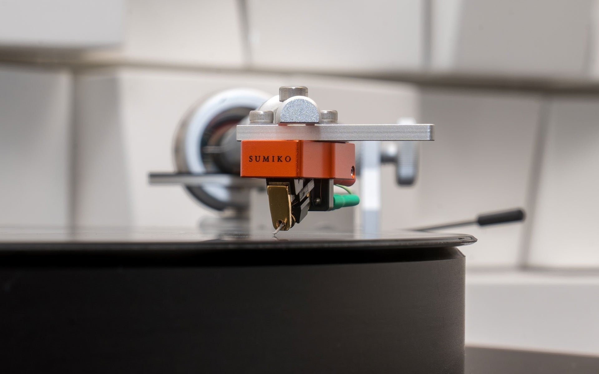 Salon 1 Audio Sumiko Oriole low output moving coil cartridge with orange body and Shibata stylus on a vinyl record