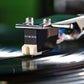 Salon 1 Audio Sumiko Rainier moving magnet phono cartridge mounted on a turntable playing a vinyl record
