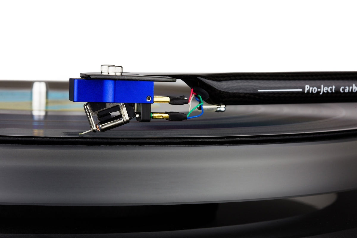 Salon 1 Audio Sumiko Songbird High moving coil cartridge mounted on a carbon tonearm playing a vinyl record