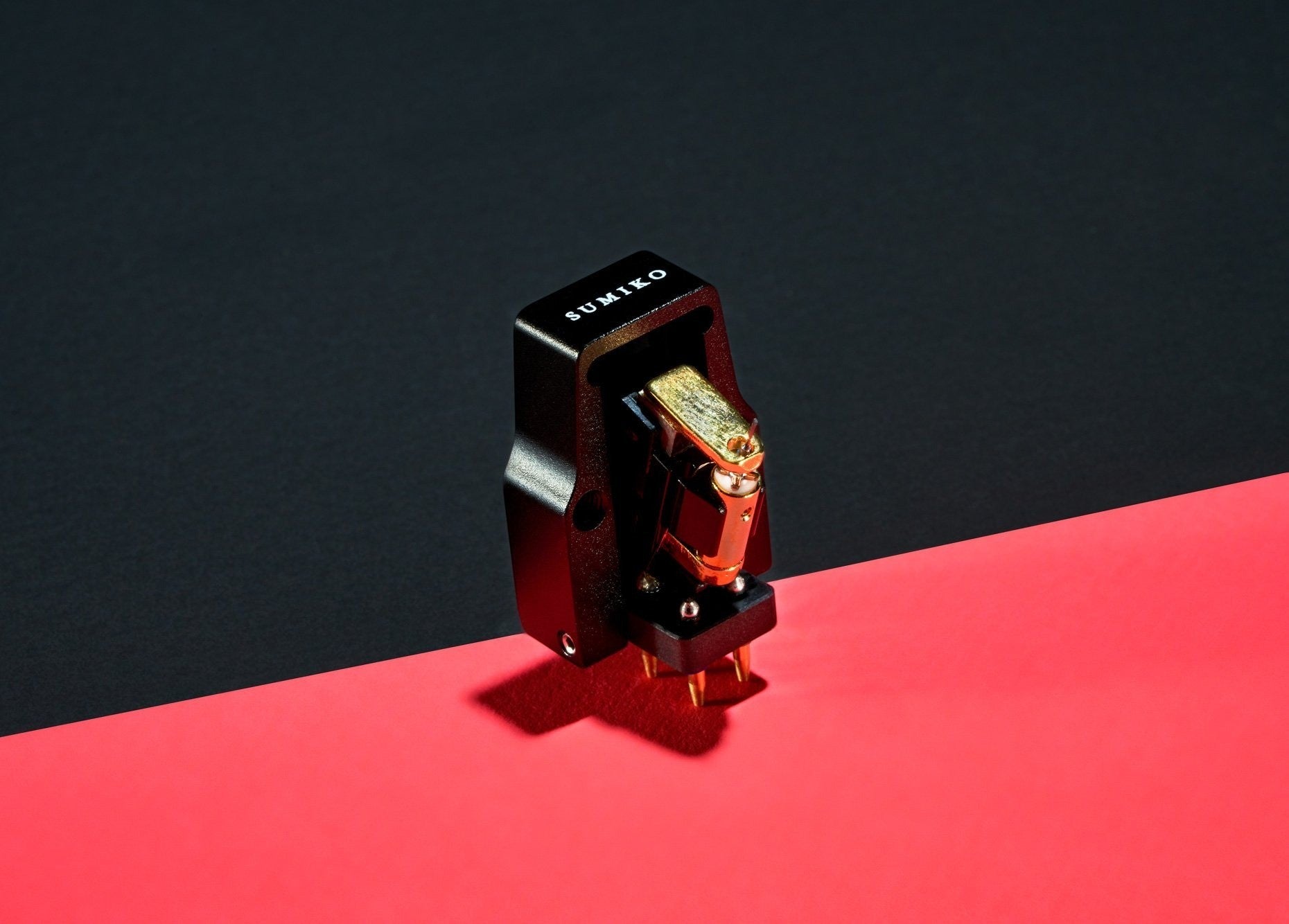 Salon 1 Audio Sumiko Starling low output moving coil cartridge with black open-body design and gold accents.
