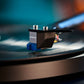 Salon 1 Audio Sumiko Wellfleet moving magnet phono cartridge with blue stylus playing a vinyl record on a turntable