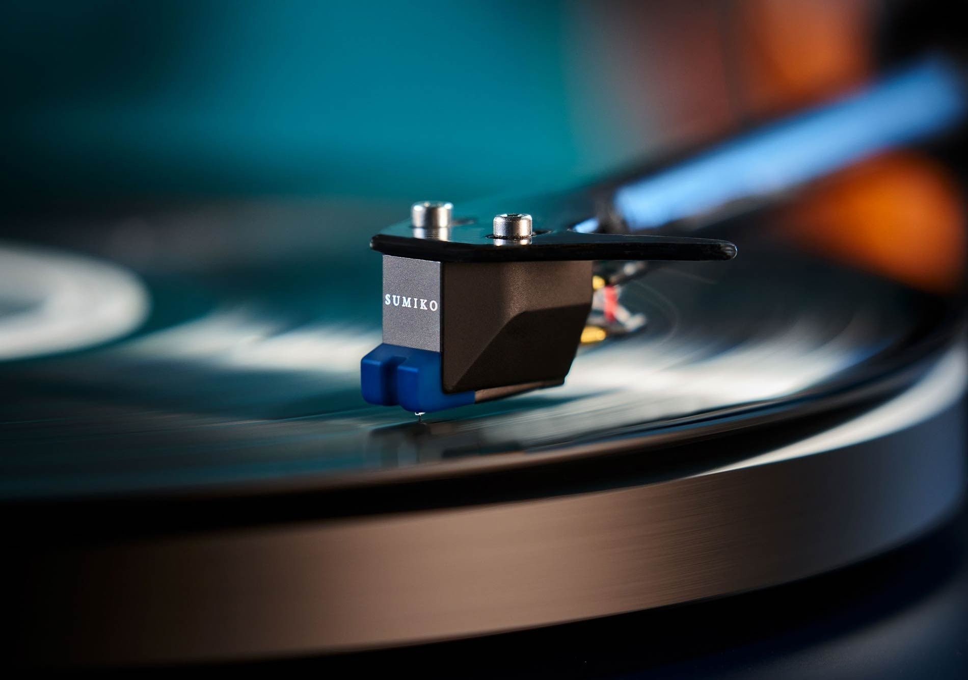 Salon 1 Audio Sumiko Wellfleet moving magnet phono cartridge with blue stylus playing a vinyl record on a turntable