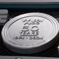 Salon 1 Audio Wilson Audio 50th anniversary commemorative metal emblem on a high-end loudspeaker cabinet.